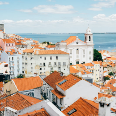 white buildings with tile roofs